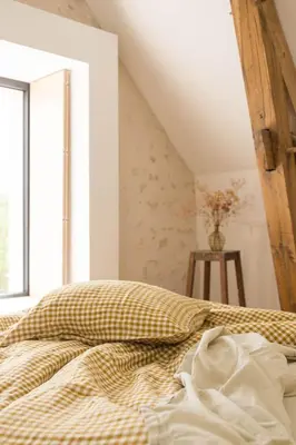 Un ou plusieurs lits dans un hébergement de l'établissement Maison d'hôtes le détour en pleine nature