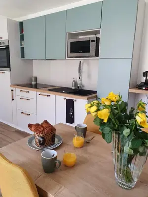 Cuisine ou kitchenette dans l'établissement Gîte Abbey Road 41 - Passez vos vacances en toute tranquillité !