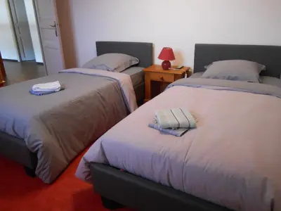 Un ou plusieurs lits dans un hébergement de l'établissement Refuge au calme
