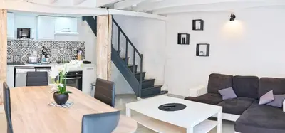Cuisine ou kitchenette dans l'établissement Le Petit Prateau - à 800m du Zoo