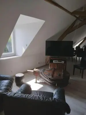 Télévision ou salle de divertissement dans l'établissement Le Manoir à proximité de Tours