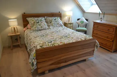 Un ou plusieurs lits dans un hébergement de l'établissement Escale à Villeperdue chambre SAAREMAA