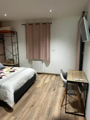 Un ou plusieurs lits dans un hébergement de l'établissement Chambre privative avec spa