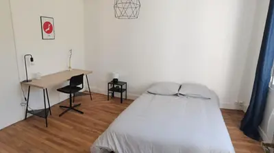 Un ou plusieurs lits dans un hébergement de l'établissement Belle Maison 12p 6 couchages TOURS CENTRE avec jardin