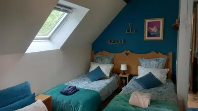 Un ou plusieurs lits dans un hébergement de l'établissement Gîte de la Poterie Fenêtre sur Loire