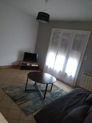 Coin salon dans l'établissement MAISON A 10MIN DU ZOO DE BEAUVAL