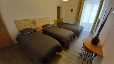 Un ou plusieurs lits dans un hébergement de l'établissement Gite Montreuillais 3 personnes au rez-de-chaussée