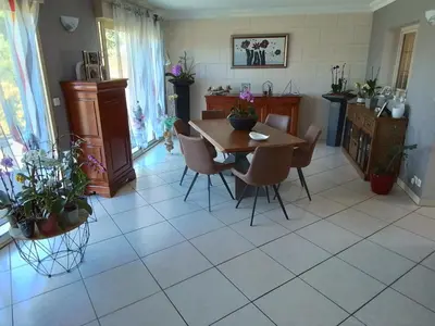 Coin salon dans l'établissement Au détour des Orchidées