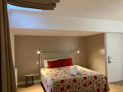 Un ou plusieurs lits dans un hébergement de l'établissement Le Manoir des Sables - Hébergement familial grand confort