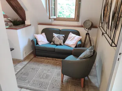 Coin salon dans l'établissement Gîte du moulin de Vandon