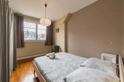 Un ou plusieurs lits dans un hébergement de l'établissement L'Averia - Appartement spacieux en hypercentre