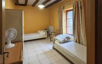 Un ou plusieurs lits dans un hébergement de l'établissement Beautiful Home In Château-La-Vallière