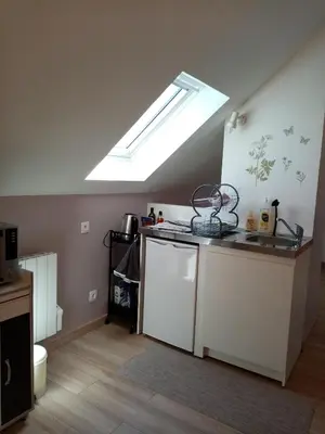 Cuisine ou kitchenette dans l'établissement Logement indépendant