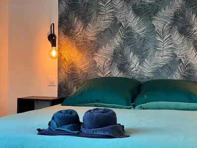 Un ou plusieurs lits dans un hébergement de l'établissement YellowHouse - CosyHouseByJanna
