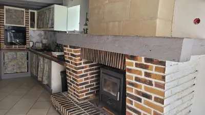 Cuisine ou kitchenette dans l'établissement Votre maison en Touraine