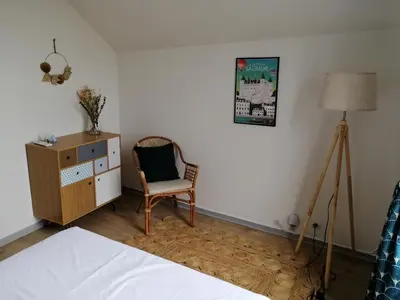 Un ou plusieurs lits dans un hébergement de l'établissement Bel appt 3 pièces, à l'étage, jardin privatif, au calme, 10 mn Saumur et CNPE
