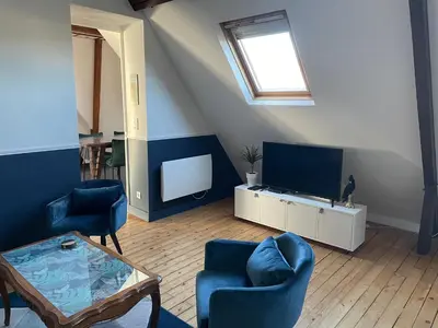Télévision ou salle de divertissement dans l'établissement L'Appart'Mans, luxueux, spacieux, bien situé