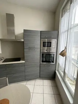 Cuisine ou kitchenette dans l'établissement Bel appartement spacieux et lumineux hyper centre Blois