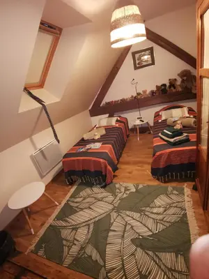 Un ou plusieurs lits dans un hébergement de l'établissement Chambres d'hôtes aux portes de CHAMBORD