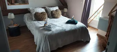 Un ou plusieurs lits dans un hébergement de l'établissement Chambres d'hôtes aux portes de CHAMBORD