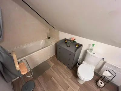 Coin salon dans l'établissement Gîte romantique avec jacuzzi privatif ambiance loveroom