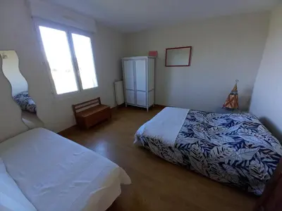 Un ou plusieurs lits dans un hébergement de l'établissement chambre d'hôte trôo