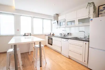 Cuisine ou kitchenette dans l'établissement Le Globe Trotter - Tours