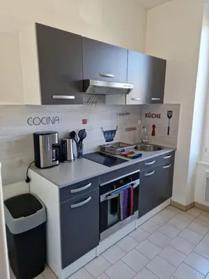 Cuisine ou kitchenette dans l'établissement La Petite Corderie Calme, Parking Gratuit