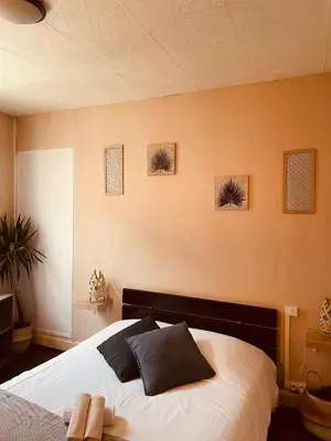 Un ou plusieurs lits dans un hébergement de l'établissement Bar du Marché - Hôtel - Restaurant