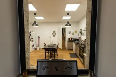 Cuisine ou kitchenette dans l'établissement Au 16 Place Saint Louis
