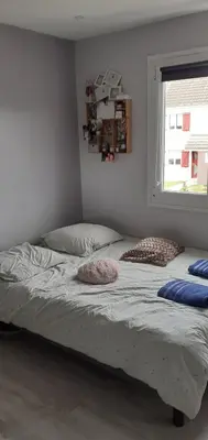 Un ou plusieurs lits dans un hébergement de l'établissement Maison au calme à proximité du circuit