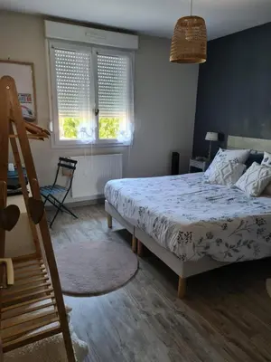 Un ou plusieurs lits dans un hébergement de l'établissement Chambre à 10 minutes du circuit des 24H du MANS et à 5 minutes sortie Autoroute A11