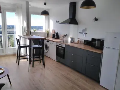 Cuisine ou kitchenette dans l'établissement LA SALAMANDRE