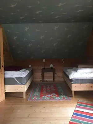 Un ou plusieurs lits dans un hébergement de l'établissement Maison de charme à Beaumont-Village avec piscine privéea