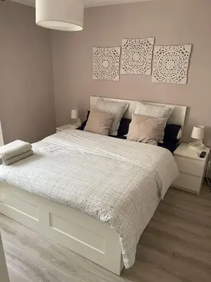 Un ou plusieurs lits dans un hébergement de l'établissement Maison tout confort en Touraine 4 chambres