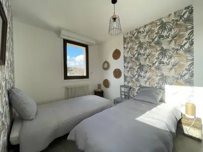 Un ou plusieurs lits dans un hébergement de l'établissement Grand appartement en vallée de la loire