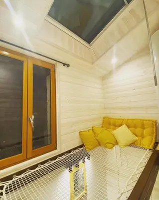 Coin salon dans l'établissement La Tiny Blue - maison insolite pour 2 - sans Tv