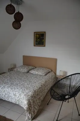 Un ou plusieurs lits dans un hébergement de l'établissement Appartement Leonard de Vinci
