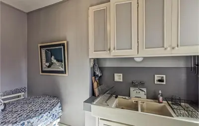 Un ou plusieurs lits dans un hébergement de l'établissement Cozy Apartment In Blois With Wifi