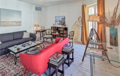 Coin salon dans l'établissement Cozy Apartment In Blois With Wifi