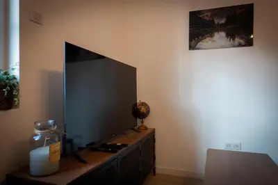 Télévision ou salle de divertissement dans l'établissement Bonuit