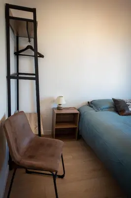 Un ou plusieurs lits dans un hébergement de l'établissement Bonuit