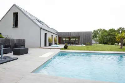 Piscine de l'établissement Appartement à l'étage de notre maison ou située à proximité