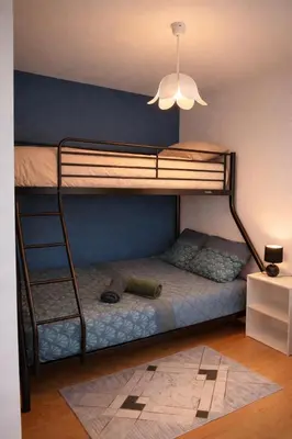 Un ou plusieurs lits dans un hébergement de l'établissement Petite maison étape Loire à vélo ou Compostelle