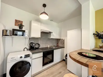 Cuisine ou kitchenette dans l'établissement Yellow Studio - Arrivée Autonome