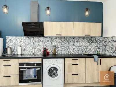 Cuisine ou kitchenette dans l'établissement Le Loft Climatisé - 6 personnes - Entrée autonome