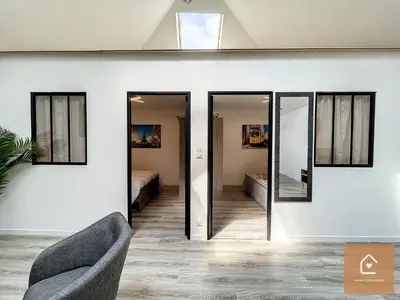 Un ou plusieurs lits dans un hébergement de l'établissement Le Loft Climatisé - 6 personnes - Entrée autonome