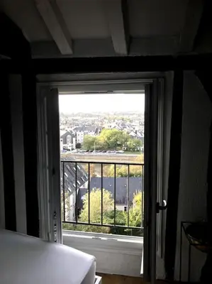 Un ou plusieurs lits dans un hébergement de l'établissement Appartement dans le Vieux Mans
