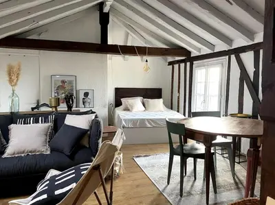 Un ou plusieurs lits dans un hébergement de l'établissement Appartement dans le Vieux Mans