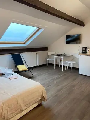 Un ou plusieurs lits dans un hébergement de l'établissement Joli studio centre-ville Vendôme